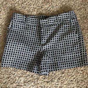 Black and white patterned shorts.